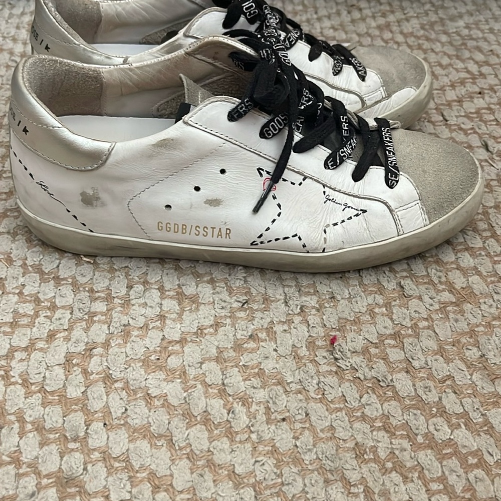 Golden Goose Distressed White Sneakers with Black Accents